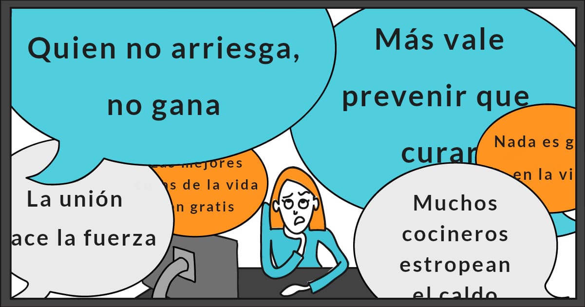 Una persona sentada ante un escritorio, que parece abrumada por numerosos proverbios contradictorios como “Quien no arriesga, no gana” y “Más vale prevenir que lamentar”, que aparecen en bocadillos a su alrededor.